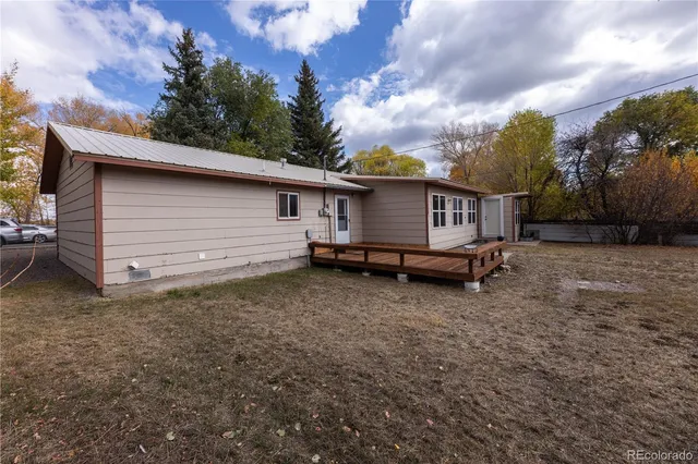 a view of backyard and tree