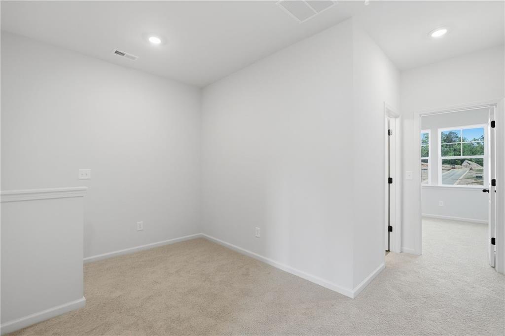299 Summit View Lane, Unit 5 Jasper, GA 30143 - Photo 12 of 43 an empty room with windows
