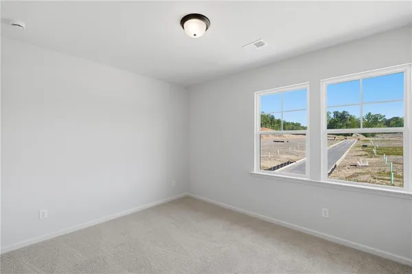 an empty room with windows