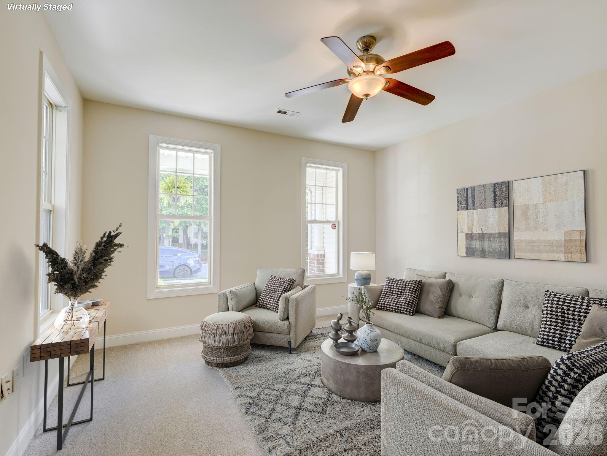 2025 Gable Way Lane Matthews, NC 28104 - Photo 14 of 36 a living room with furniture