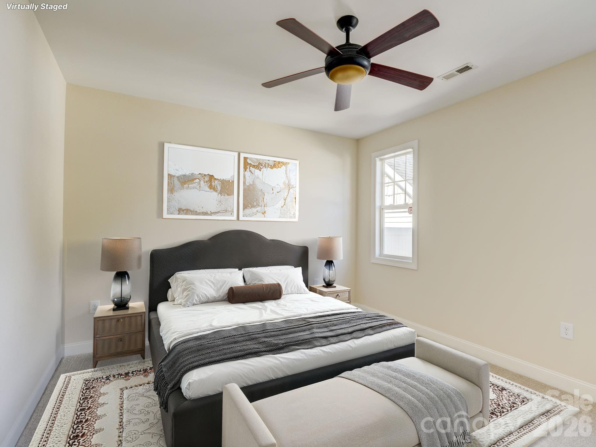 2025 Gable Way Lane Matthews, NC 28104 - Photo 23 of 36 a bedroom with a bed and a window