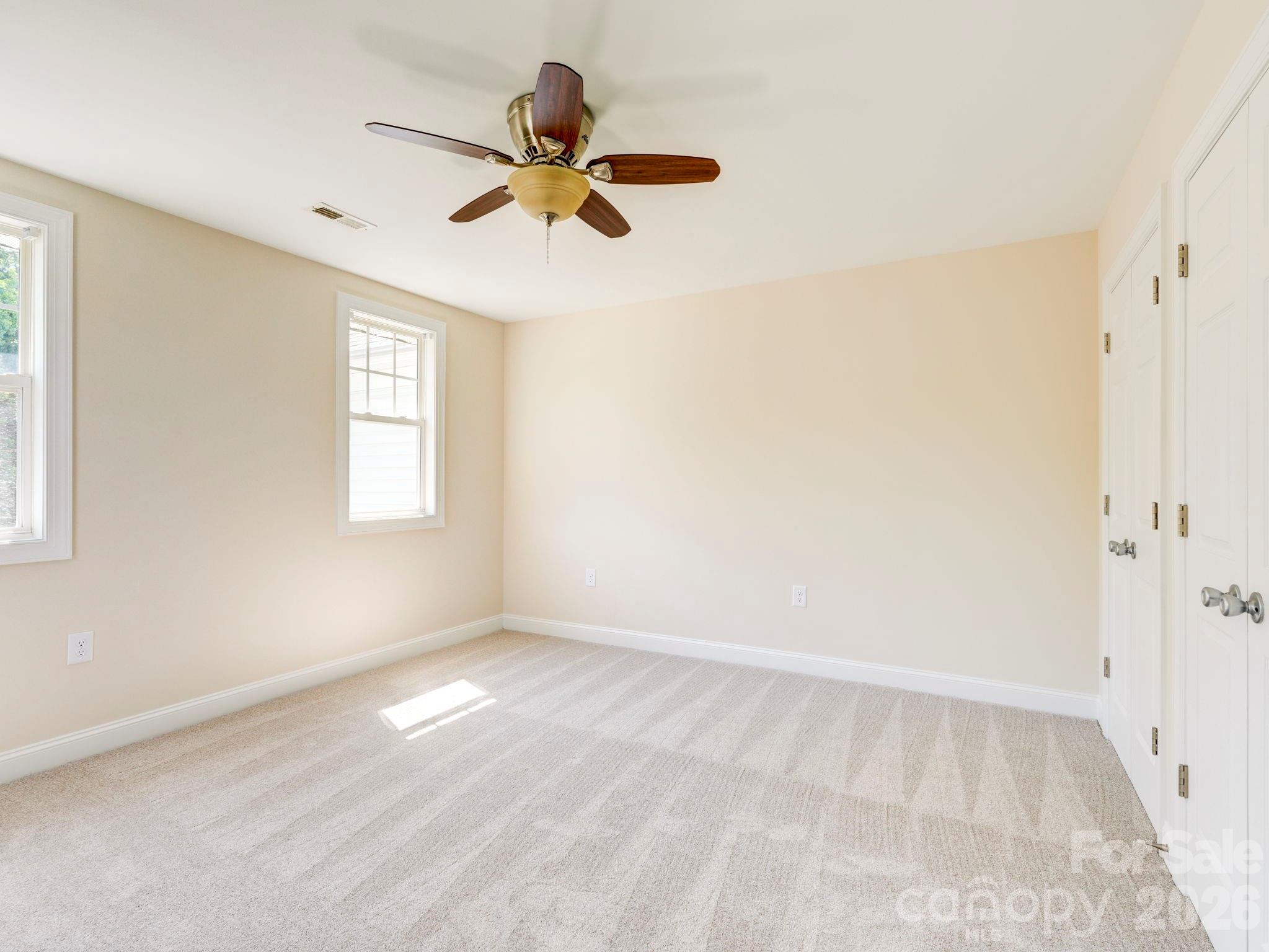 2025 Gable Way Lane Matthews, NC 28104 - Photo 30 of 36 wooden floor in an empty room with a window
