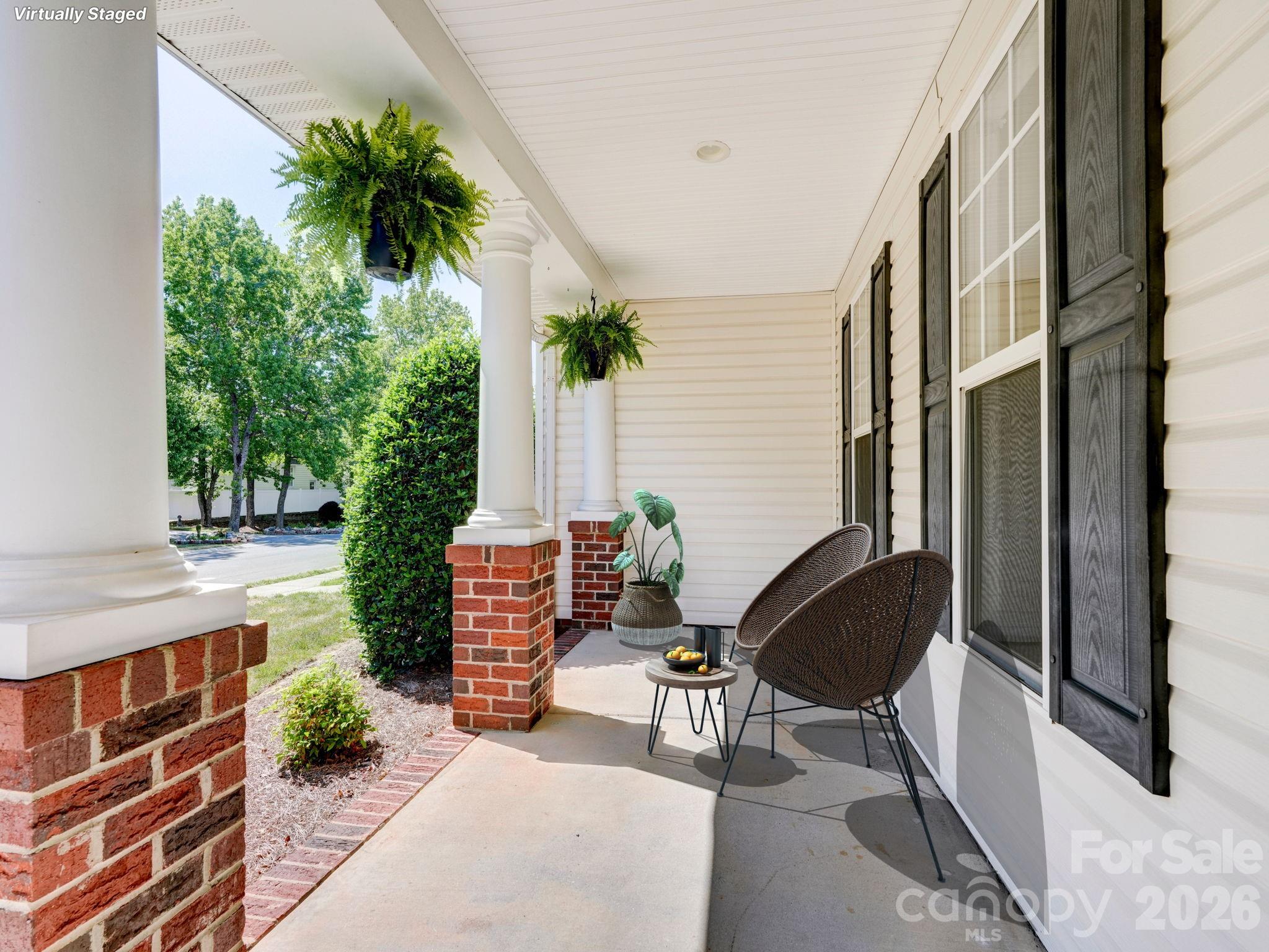 2025 Gable Way Lane Matthews, NC 28104 - Photo 5 of 36 a backyard of a house with outdoor seating