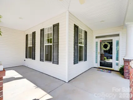 a view of an entryway with a door