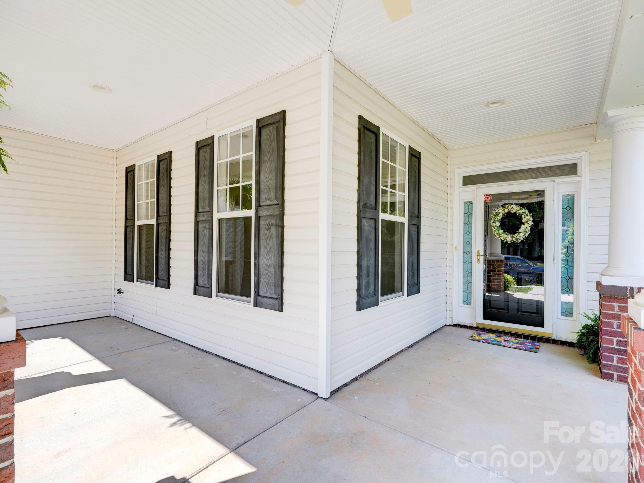 2025 Gable Way Lane Matthews, NC 28104 - Photo 6 of 36 a view of an entryway with a door