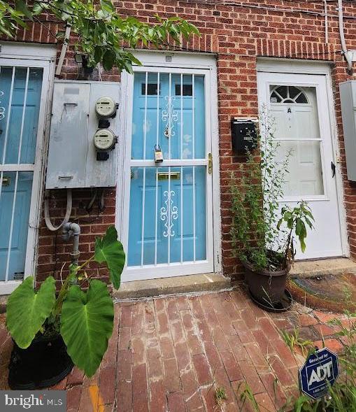 1422 W Street Southeast, Unit 2 Washington, DC 20020 - Photo 1 of 12 a front view of a house with a yard