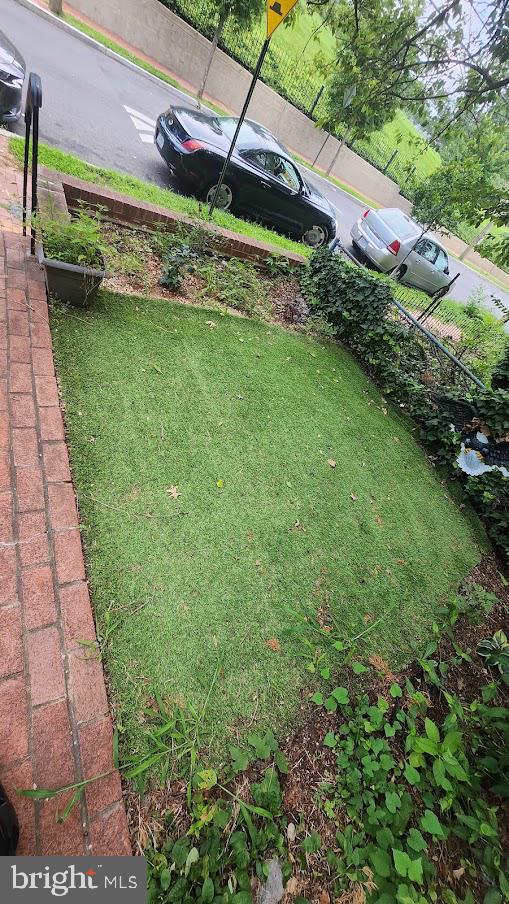 1422 W Street Southeast, Unit 2 Washington, DC 20020 - Photo 4 of 12 a view of a garden with a building