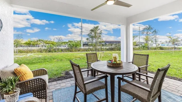 a view of a patio with a yard