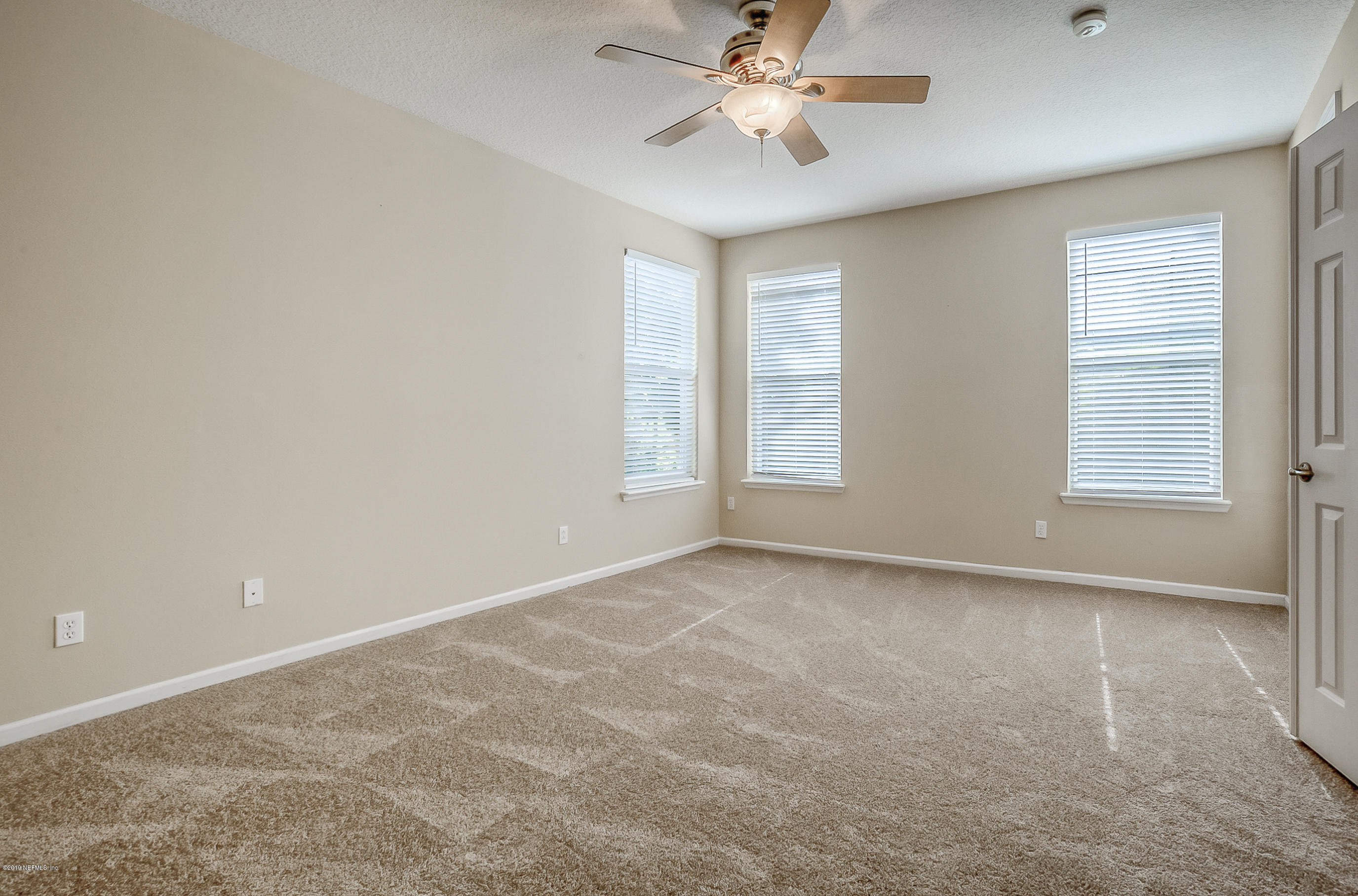 3424 South Saxxon Road St. Augustine, FL 32092 - Photo 11 of 75 a view of an empty room with a window