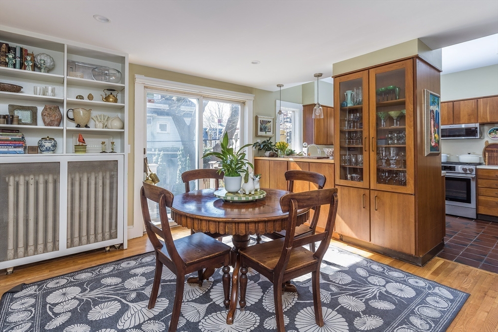37 Osborne Road Brookline, MA 02446 - Photo 11 of 16 a dining room with furniture window and wooden floor