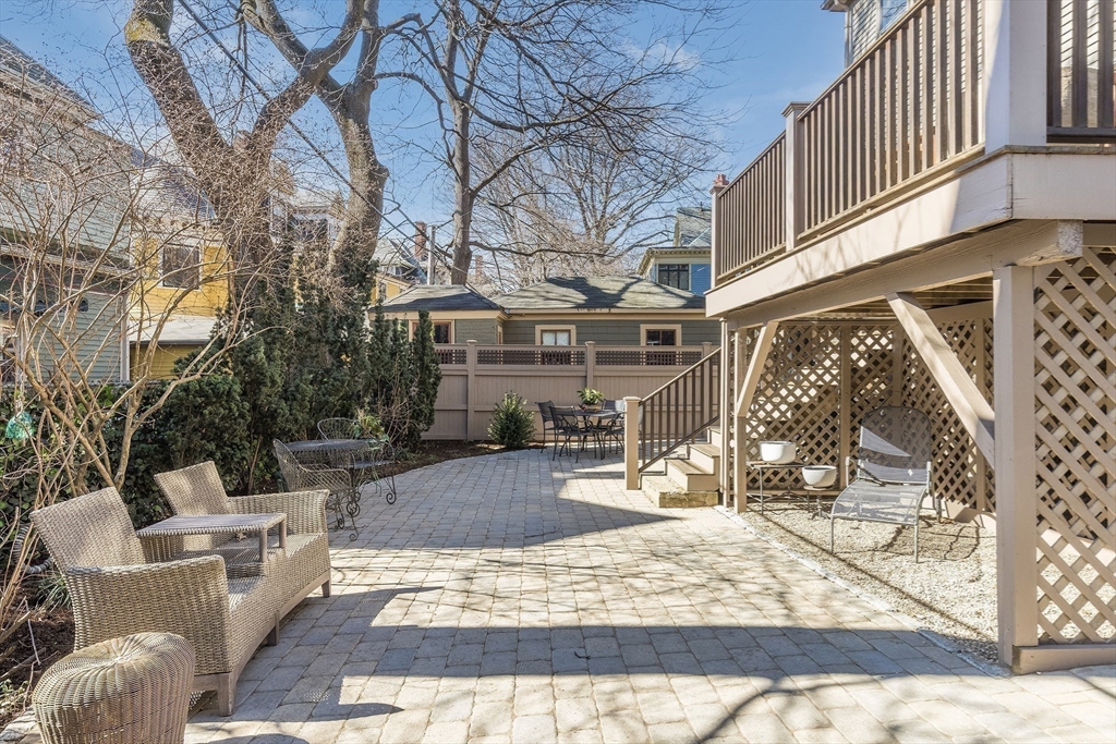 37 Osborne Road Brookline, MA 02446 - Photo 15 of 16 a view of a house with a yard