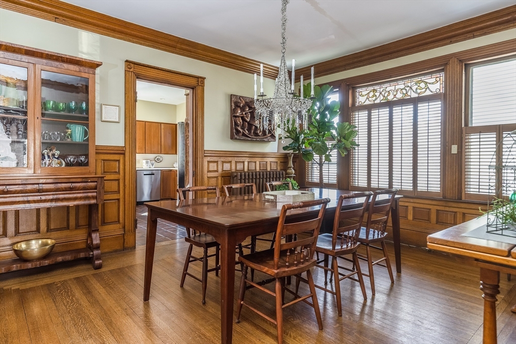 37 Osborne Road Brookline, MA 02446 - Photo 5 of 16 a view of a dining room with furniture window and wooden floor