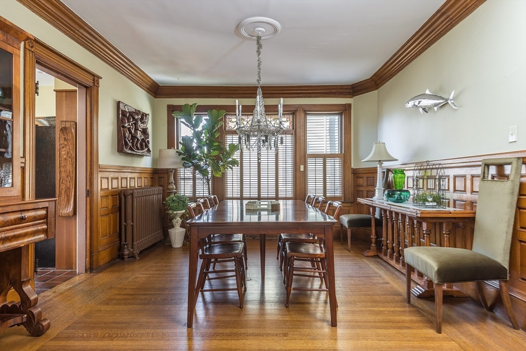 37 Osborne Road Brookline, MA 02446 - Photo 6 of 16 a view of a dining room with furniture window and wooden floor