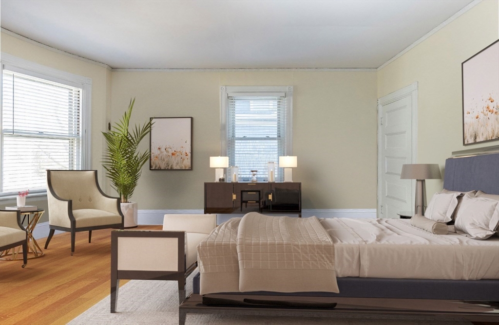 37 Osborne Road Brookline, MA 02446 - Photo 8 of 16 a bedroom with a bed and window