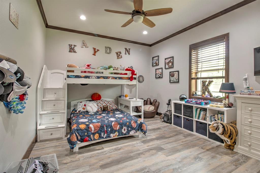 1024 Jordan Creek Road Collinsville, TX 76233 - Photo 17 of 40 Oversized secondary bedroom with walk in closets.