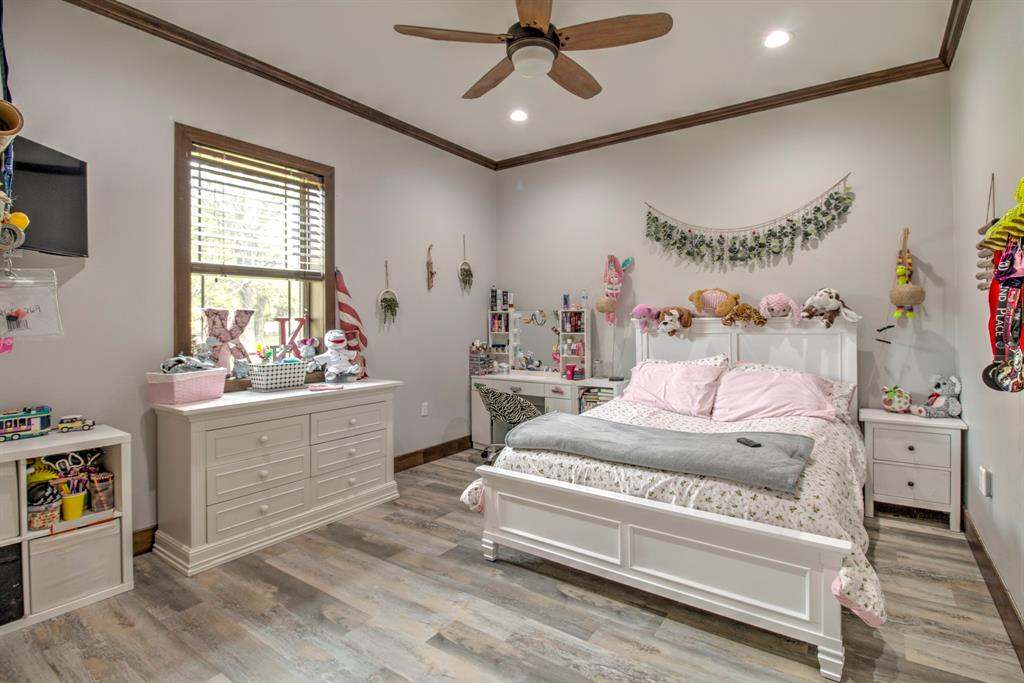 1024 Jordan Creek Road Collinsville, TX 76233 - Photo 19 of 40 Oversized secondary bedroom with walk in closets.