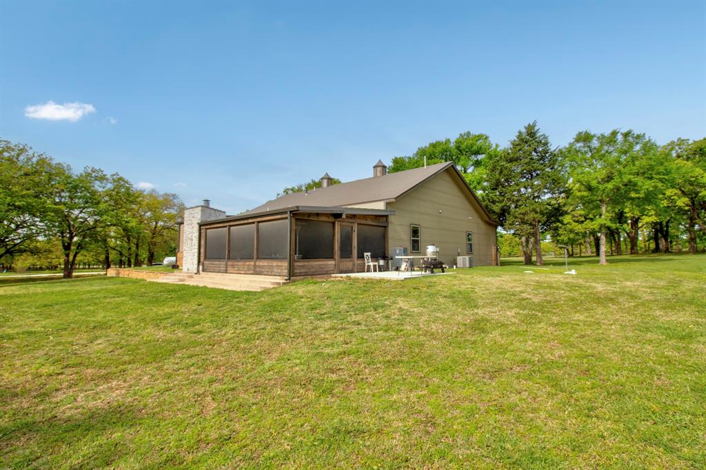 1024 Jordan Creek Road Collinsville, TX 76233 - Photo 28 of 40 Side View of the property