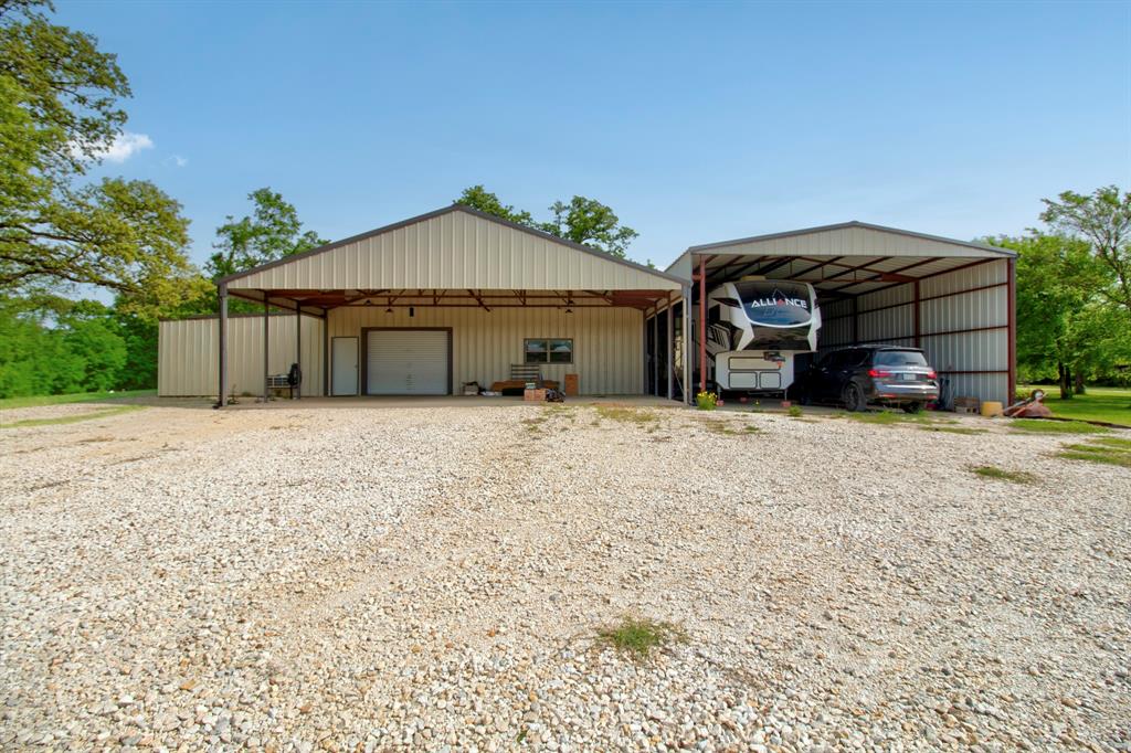1024 Jordan Creek Road Collinsville, TX 76233 - Photo 29 of 40 40x40 workshop, bring all the outdoor toys!