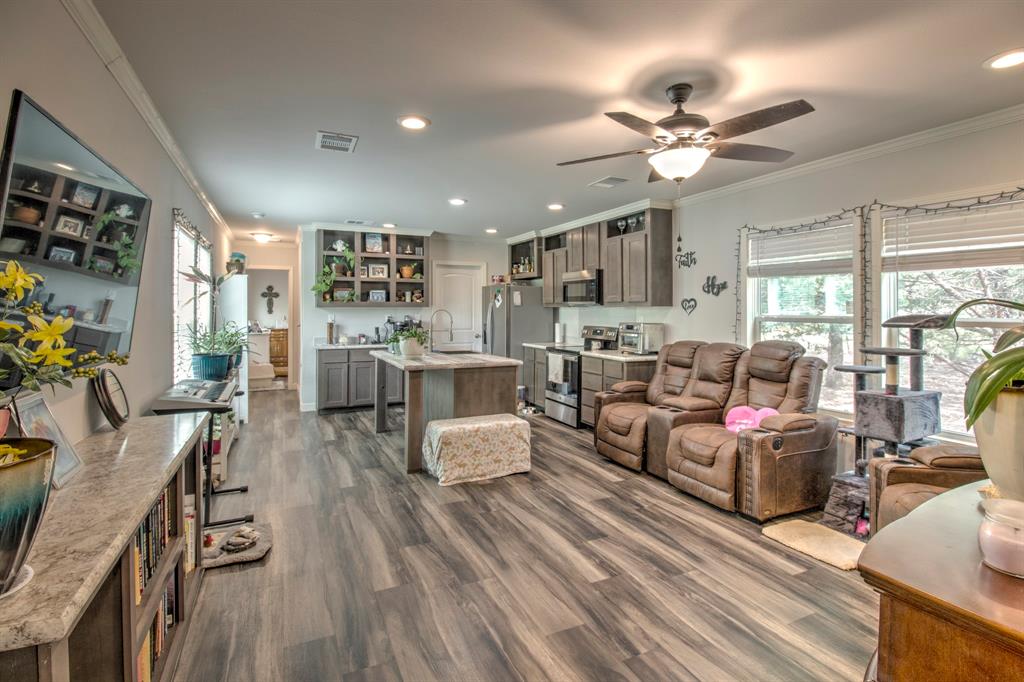 1024 Jordan Creek Road Collinsville, TX 76233 - Photo 35 of 40 Open Concept, Living room and kitchen area.