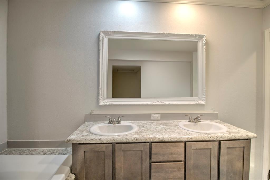 1024 Jordan Creek Road Collinsville, TX 76233 - Photo 38 of 40 Primary bath, off the master bedroom with double vanity!