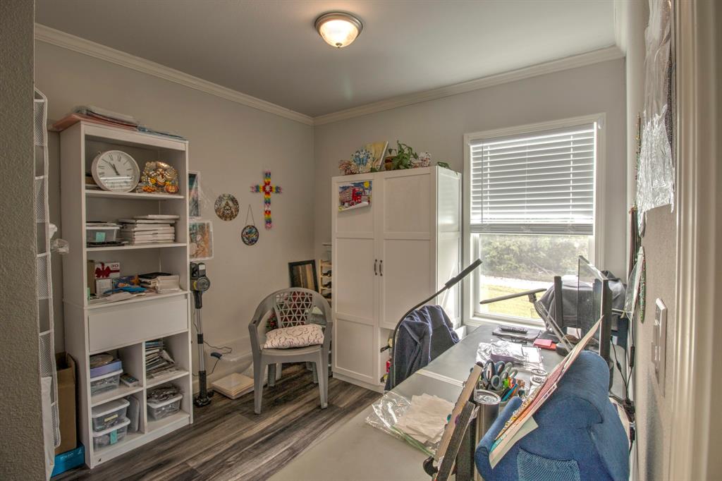 1024 Jordan Creek Road Collinsville, TX 76233 - Photo 39 of 40 Whether you envision a productive home office bathed in natural light or a cozy second bedroom for guests, make this space your own!