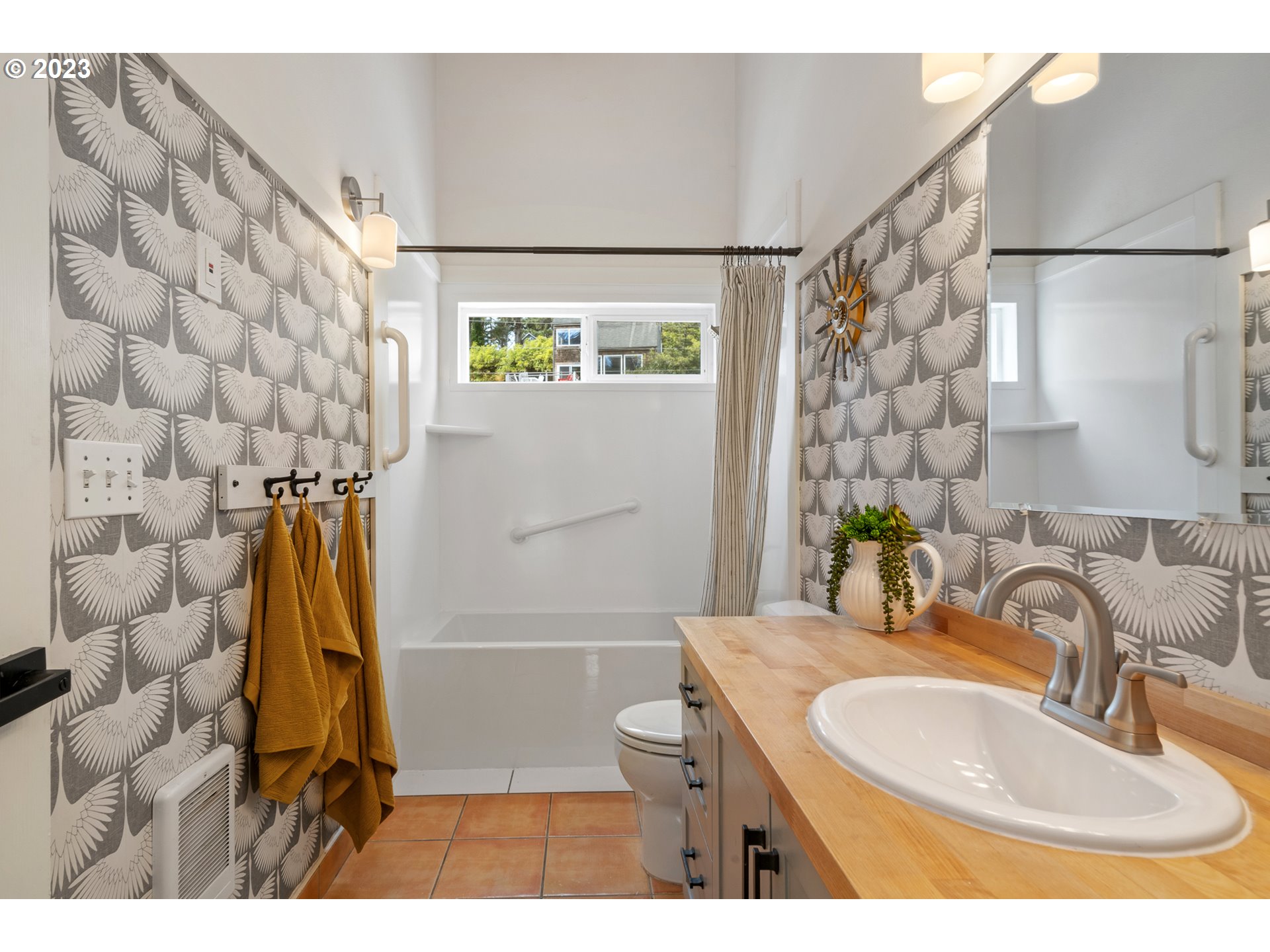 8189 Nehalem Road Manzanita, OR 97130 - Photo 16 of 30 a bathroom with a sink and a mirror