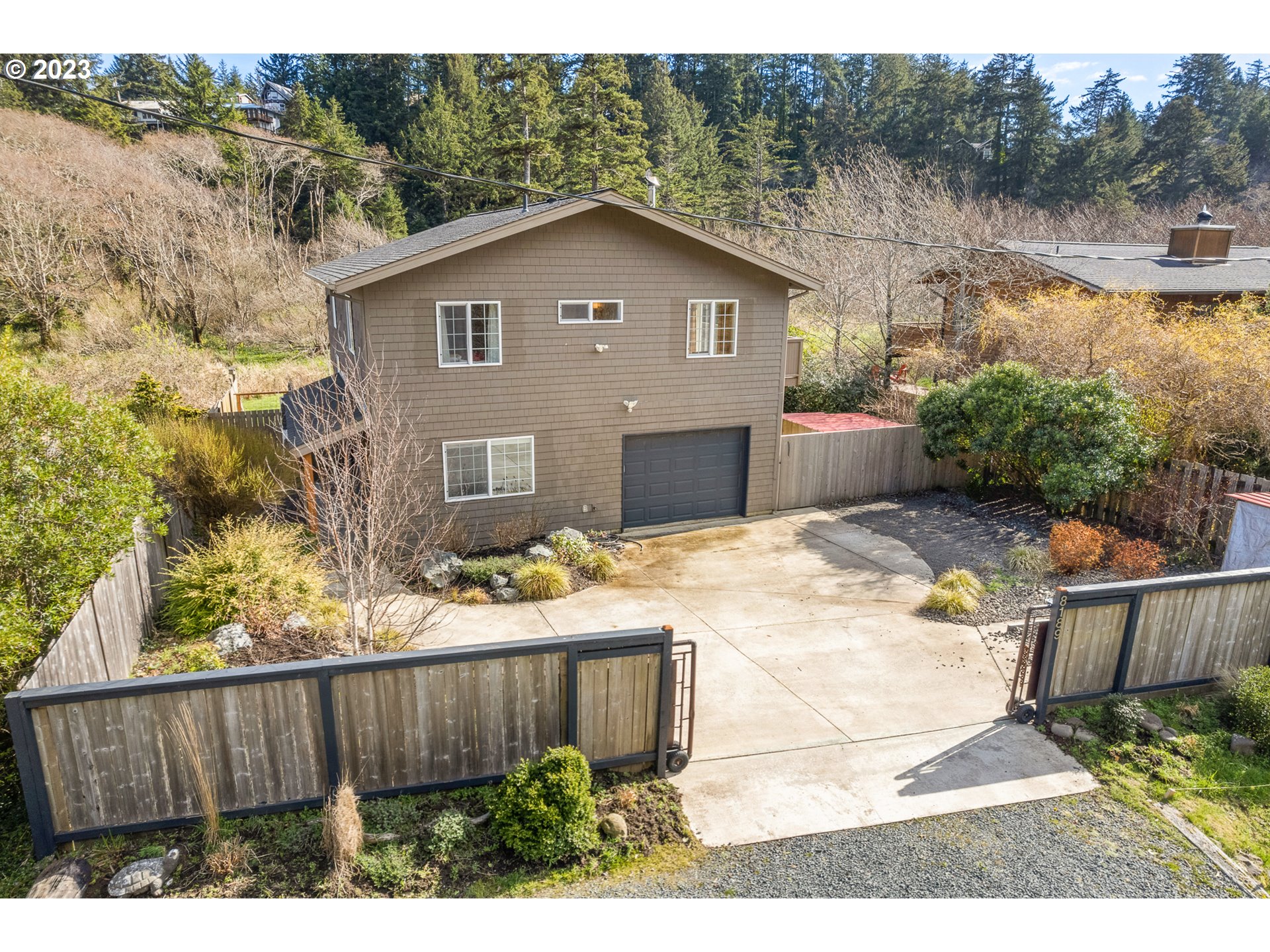 8189 Nehalem Road Manzanita, OR 97130 - Photo 4 of 30 a house view with a garden