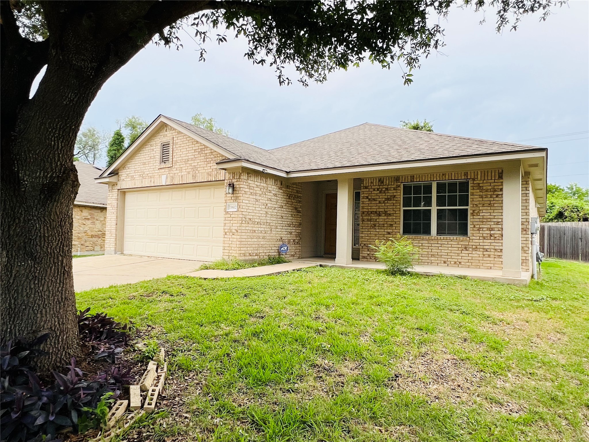 11612 Timber Heights Drive Austin, TX 78754 - Photo 1 of 28 A classic brick exterior with a welcoming covered entrance provides timeless curb appeal.