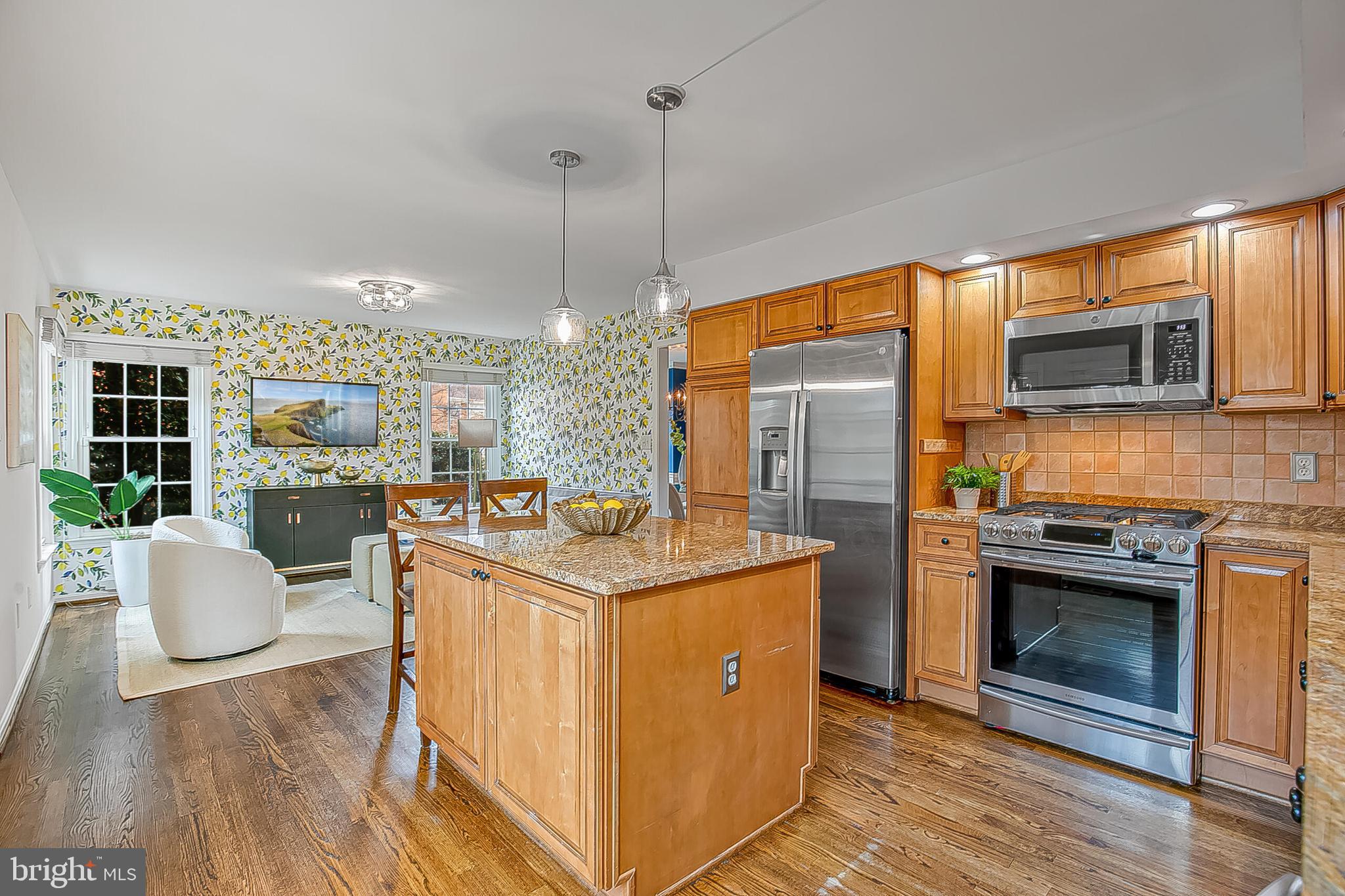 1824 Duffield Lane Alexandria, VA 22307 - Photo 12 of 64 a kitchen with stainless steel appliances granite countertop a stove a sink and a refrigerator