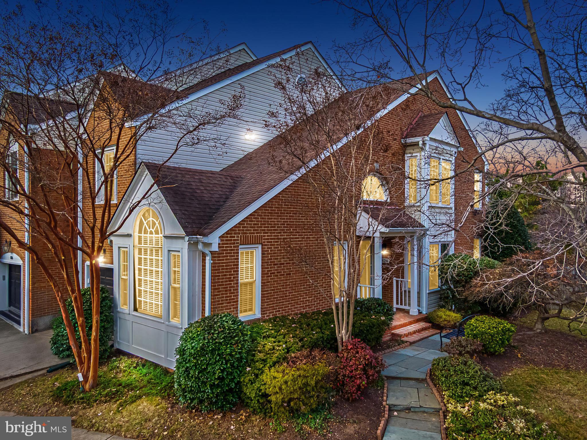 1824 Duffield Lane Alexandria, VA 22307 - Photo 2 of 64 a front view of a house with garden