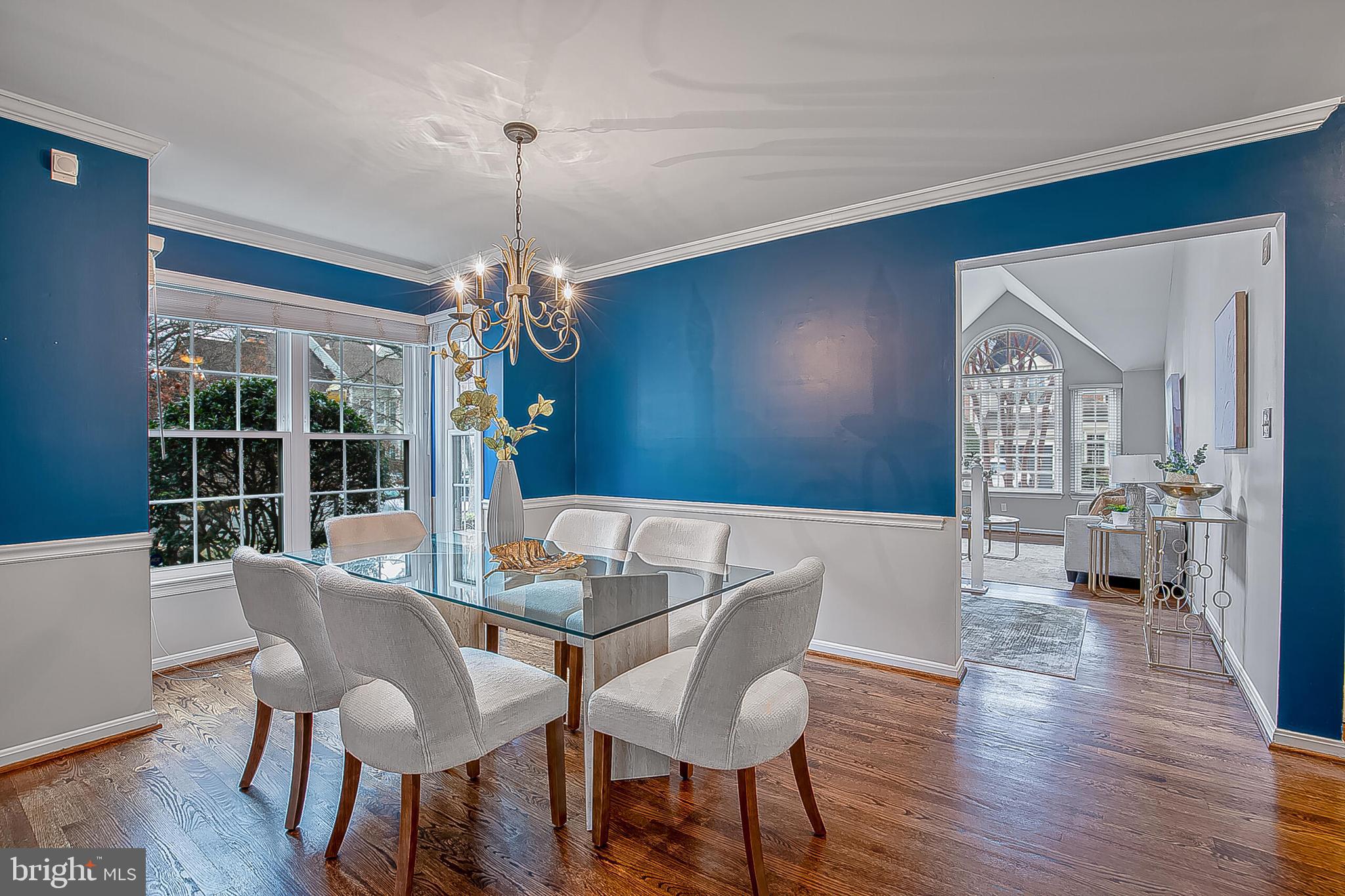 1824 Duffield Lane Alexandria, VA 22307 - Photo 21 of 64 a view of a dining room with furniture wooden floor and a chandelier