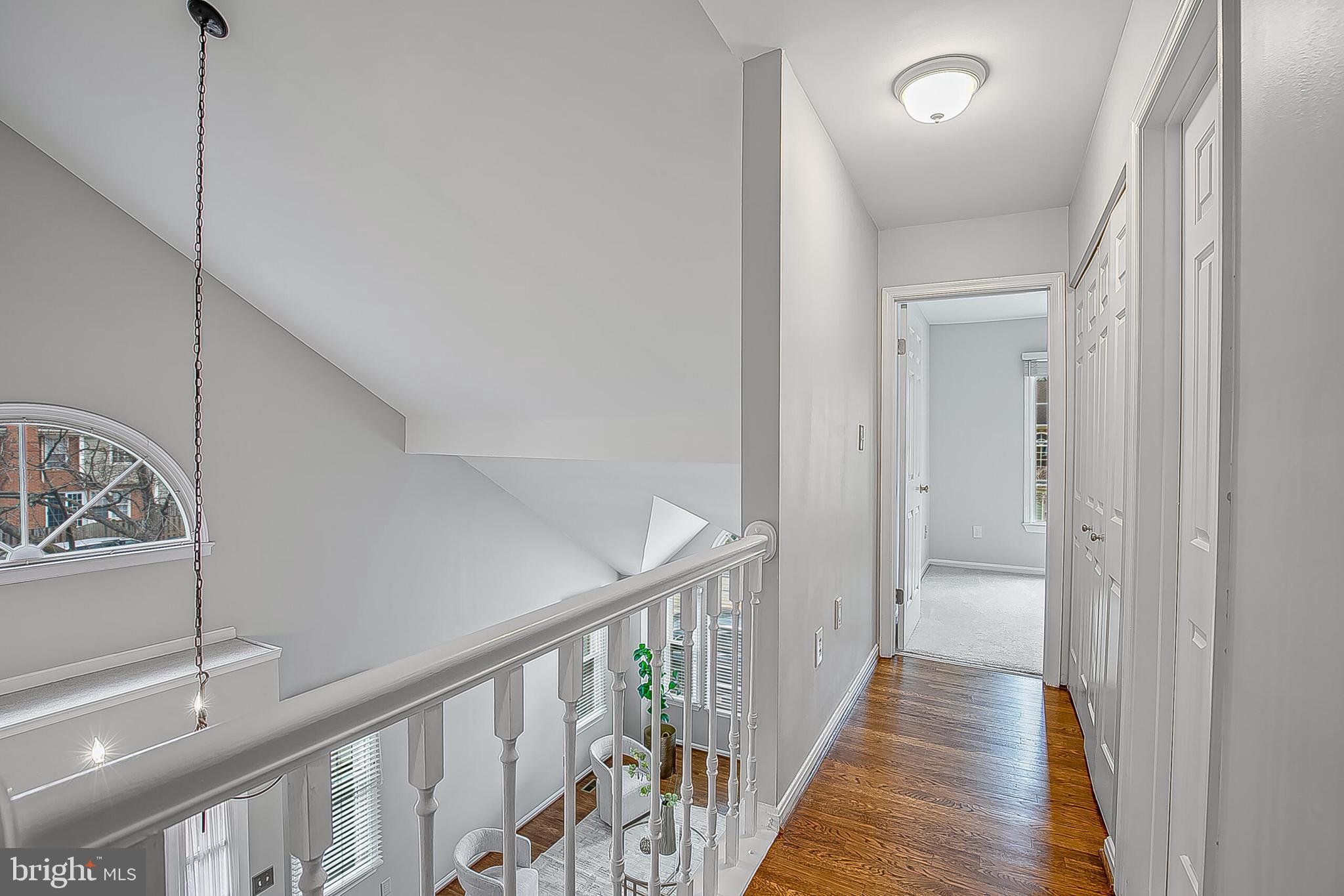 1824 Duffield Lane Alexandria, VA 22307 - Photo 31 of 64 a view of a hallway with wooden floor