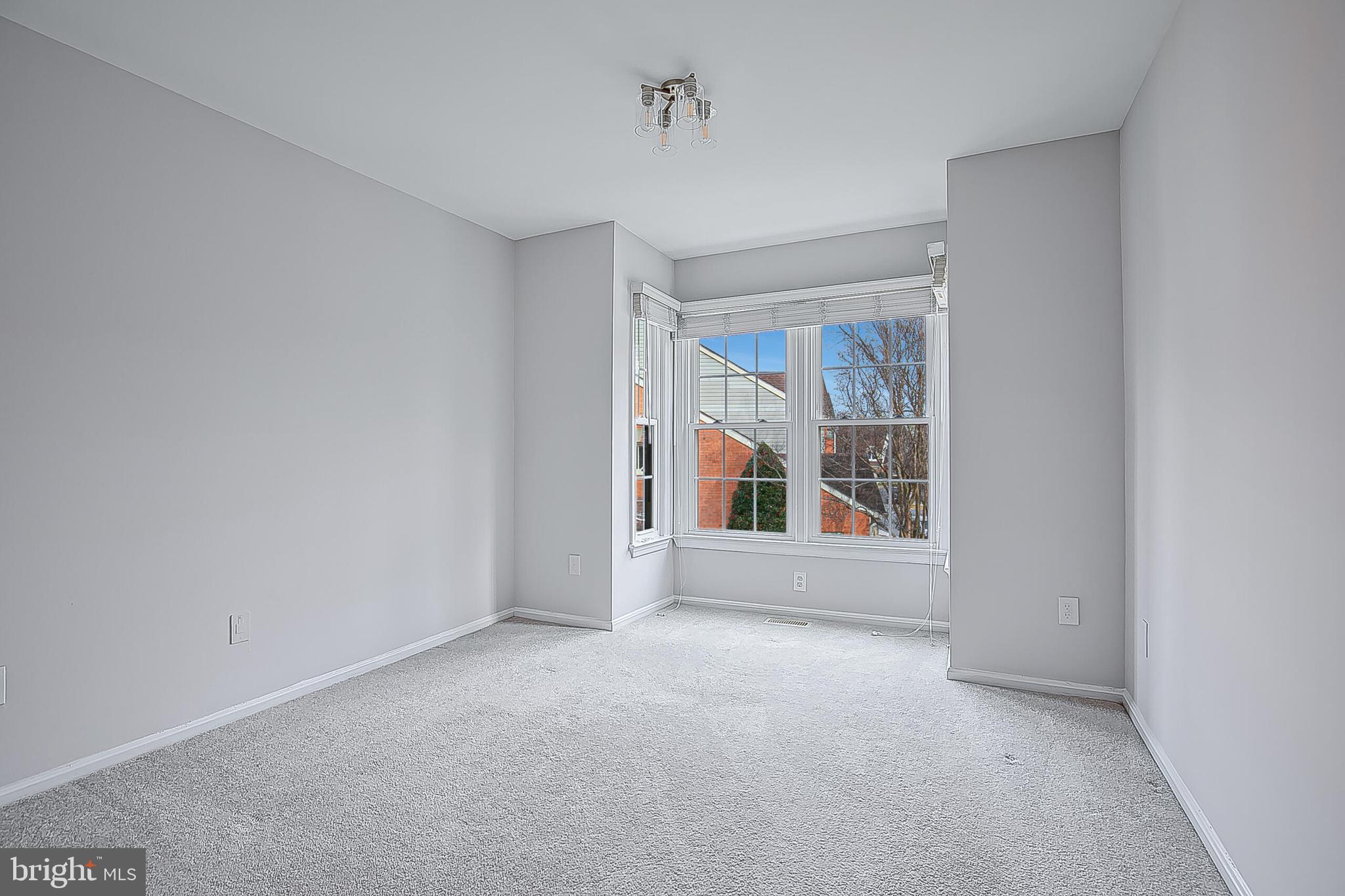 1824 Duffield Lane Alexandria, VA 22307 - Photo 38 of 64 a view of an empty room with a window