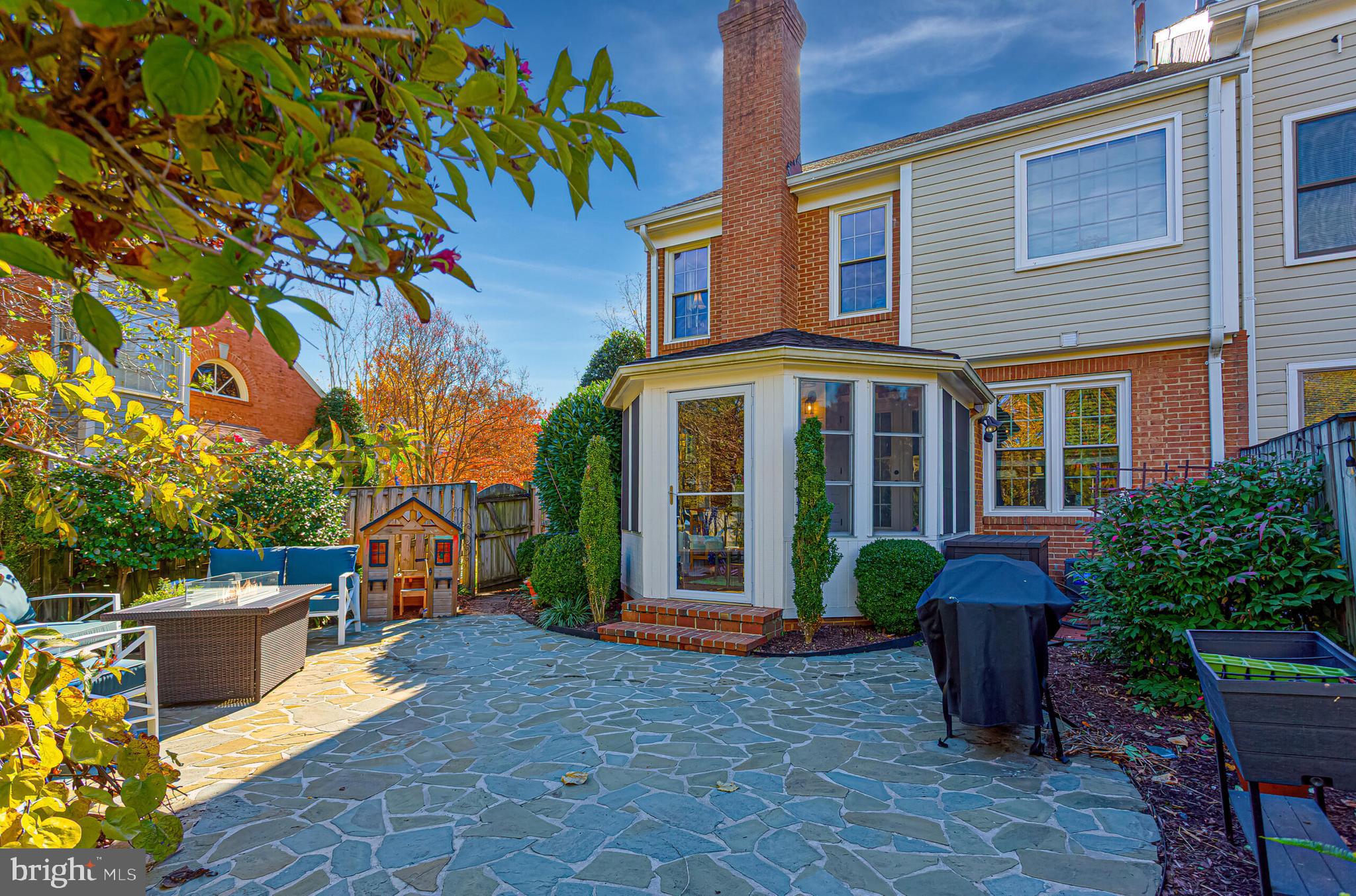 1824 Duffield Lane Alexandria, VA 22307 - Photo 54 of 64 a front view of a house with garden and plants