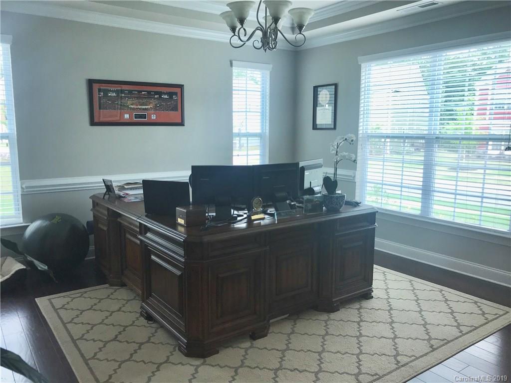 566 Brookhaven Drive, Unit 89 Fort Mill, SC 29708 - Photo 16 of 22 a living room with furniture and window