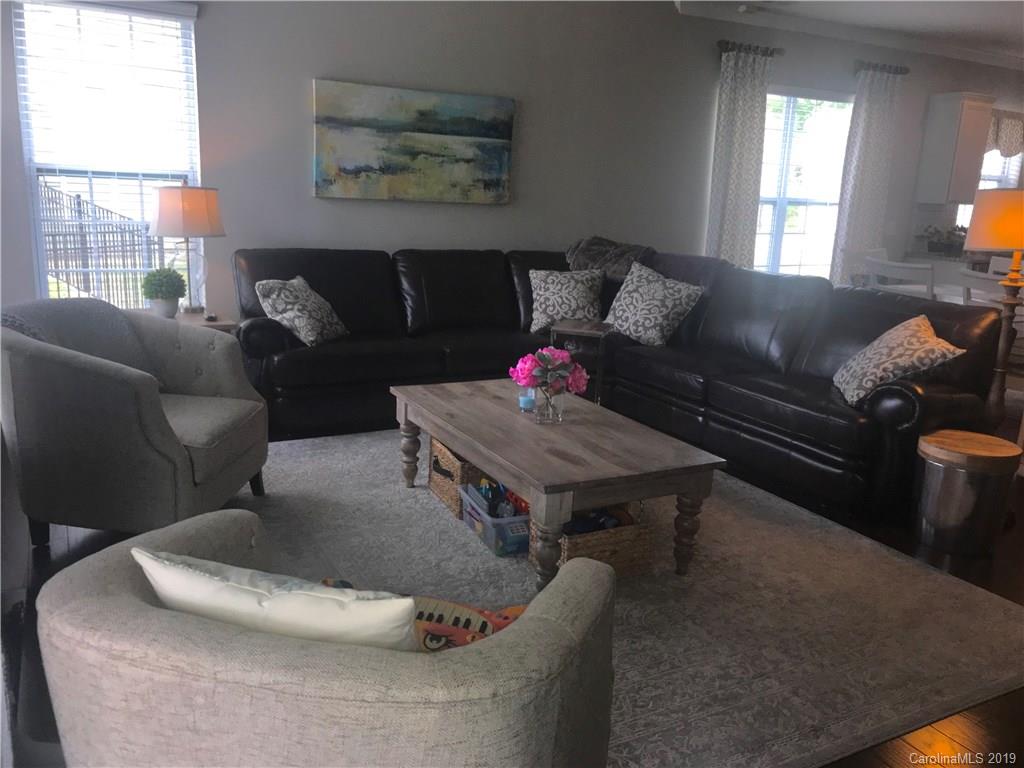566 Brookhaven Drive, Unit 89 Fort Mill, SC 29708 - Photo 20 of 22 a living room with furniture and a window