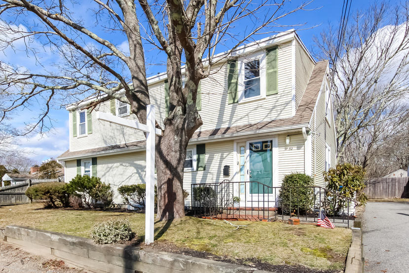 32 Seabrook Road Hyannis, MA 02601 - Photo 3 of 21 a view of a white house with a large tree
