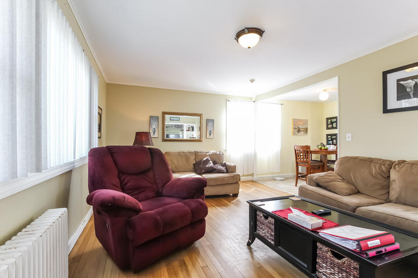 32 Seabrook Road Hyannis, MA 02601 - Photo 9 of 21 a living room with furniture a flat screen tv and a window