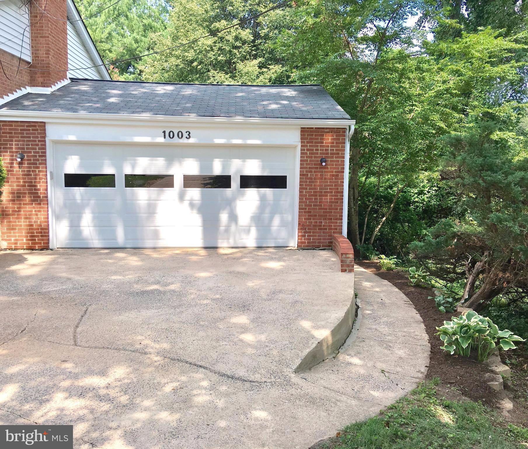 1003 Dead Run Drive McLean, VA 22101 - Photo 25 of 26 2 Car Garage and Path to Backyard