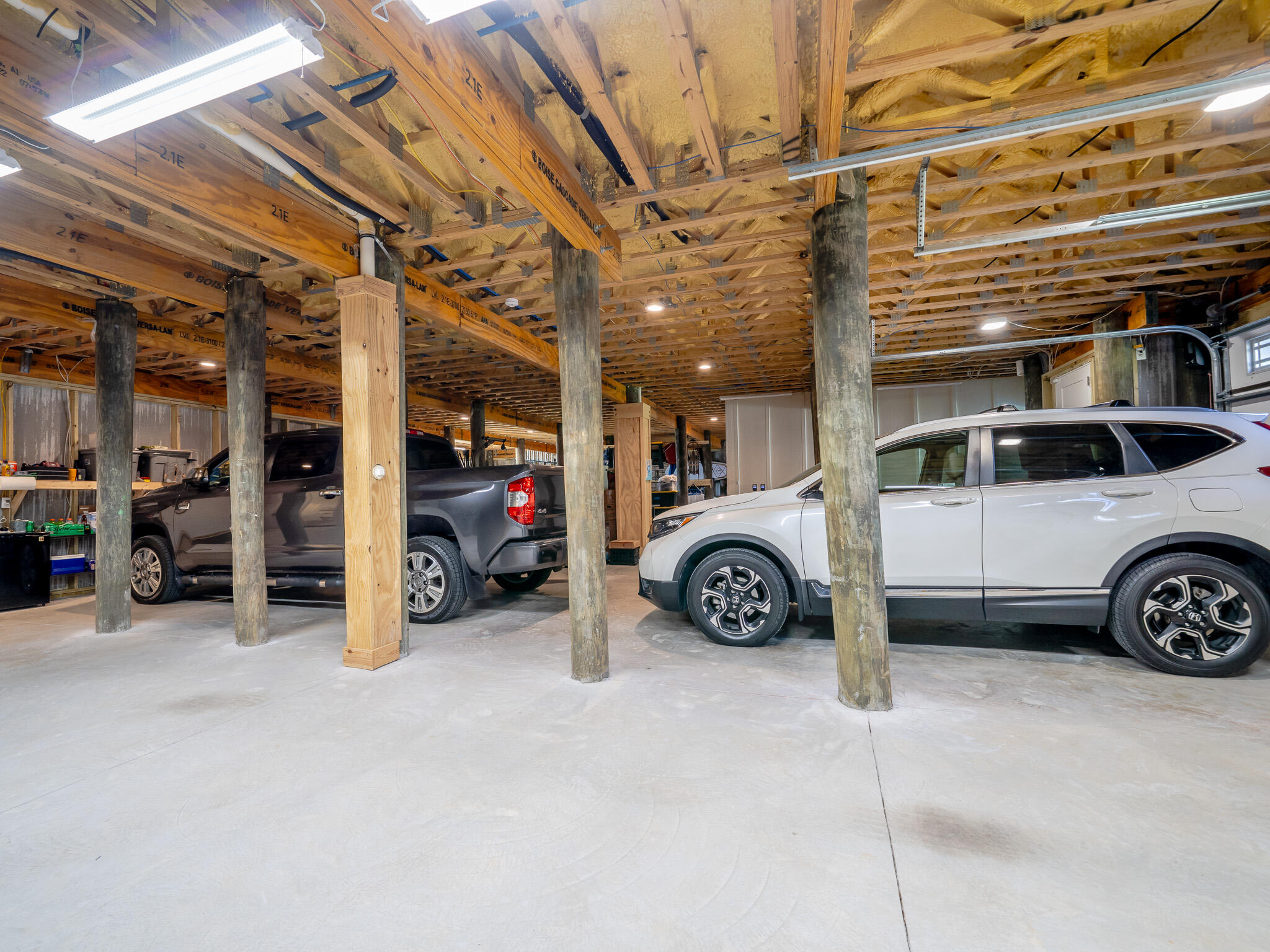 68 Dolphin Place Freeport, FL 32439 - Photo 103 of 118 a view of a garage with parked cars