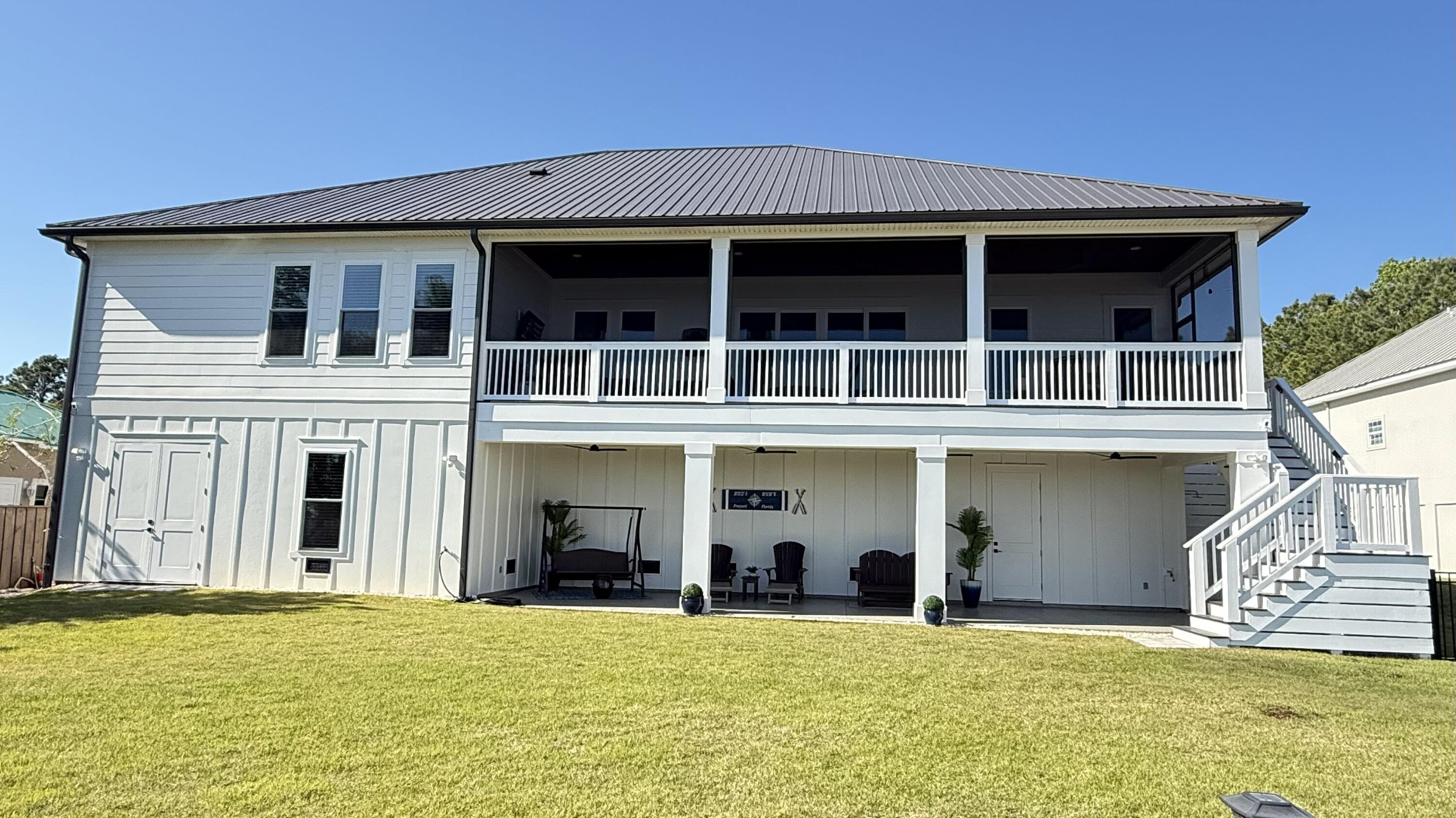 68 Dolphin Place Freeport, FL 32439 - Photo 12 of 118 a view of a house with a swimming pool