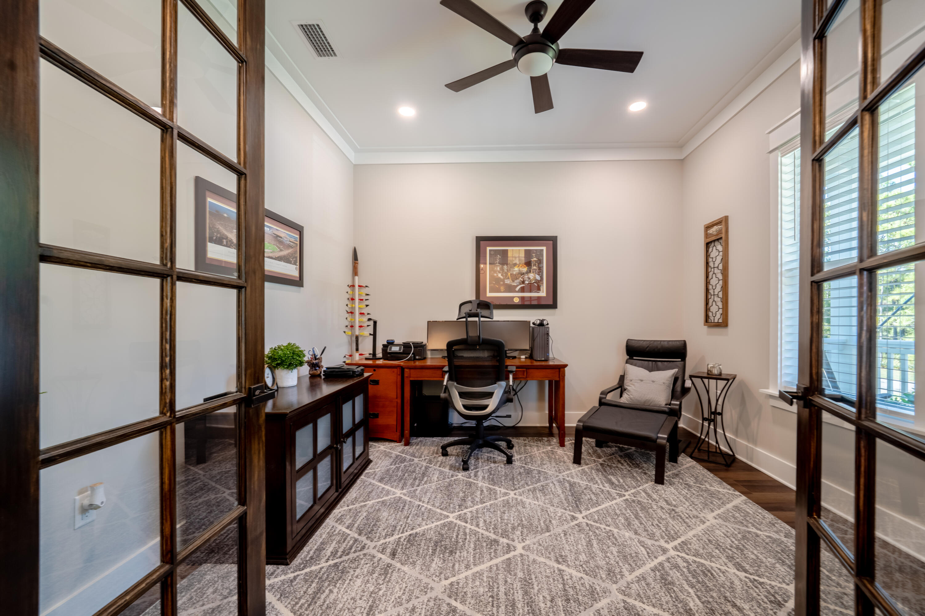 68 Dolphin Place Freeport, FL 32439 - Photo 16 of 118 a view of a workspace with furniture and a window