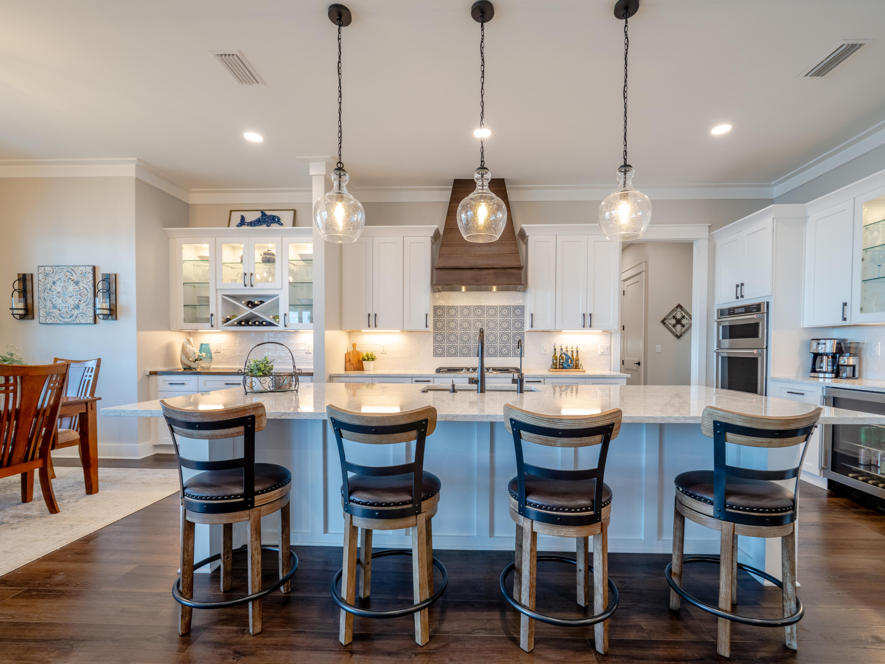 68 Dolphin Place Freeport, FL 32439 - Photo 22 of 118 a view of a dining room with furniture and wooden floor