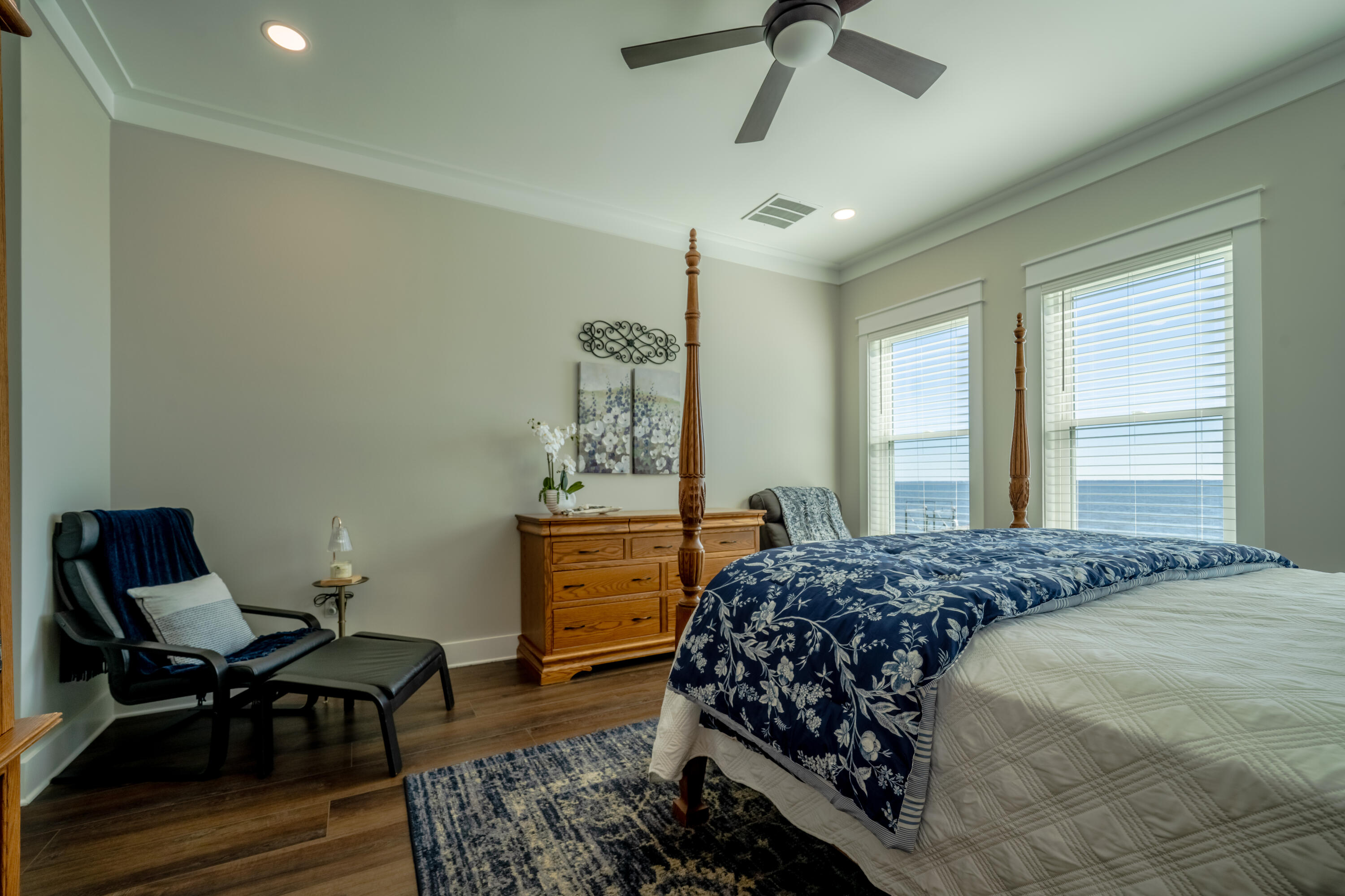 68 Dolphin Place Freeport, FL 32439 - Photo 49 of 118 a bedroom with a bed and wooden floor