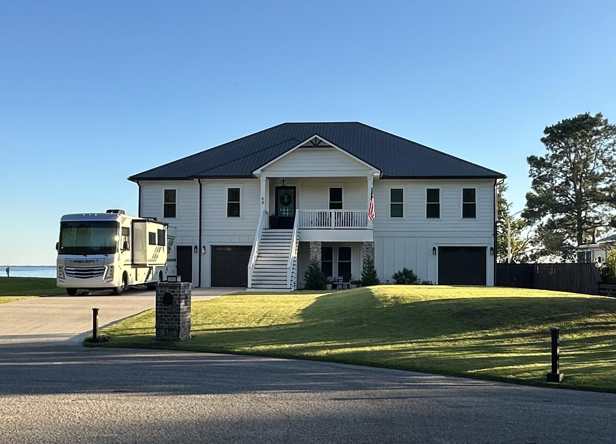 68 Dolphin Place Freeport, FL 32439 - Photo 5 of 118 a view of a house with swimming pool