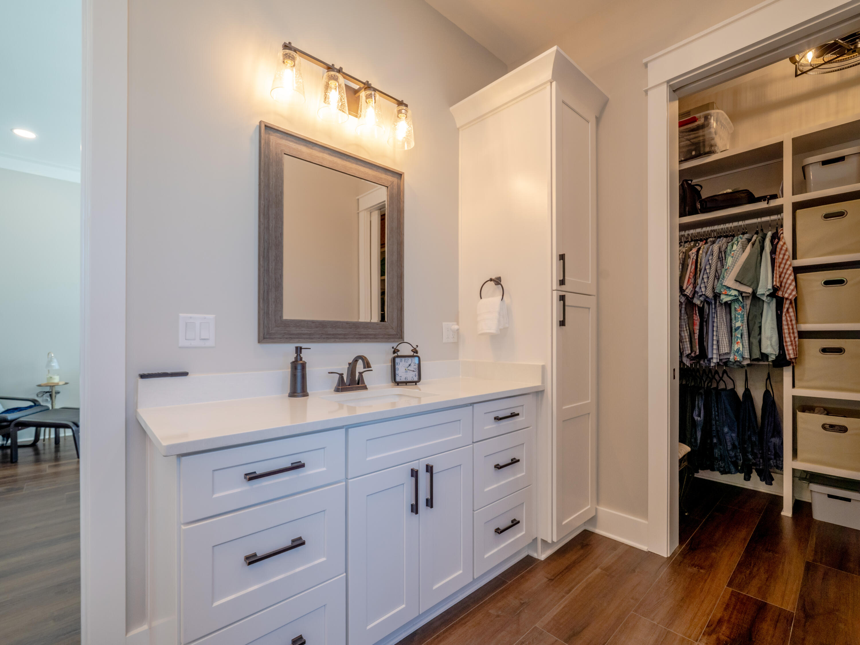 68 Dolphin Place Freeport, FL 32439 - Photo 58 of 118 a bathroom with a sink a toilet and a mirror