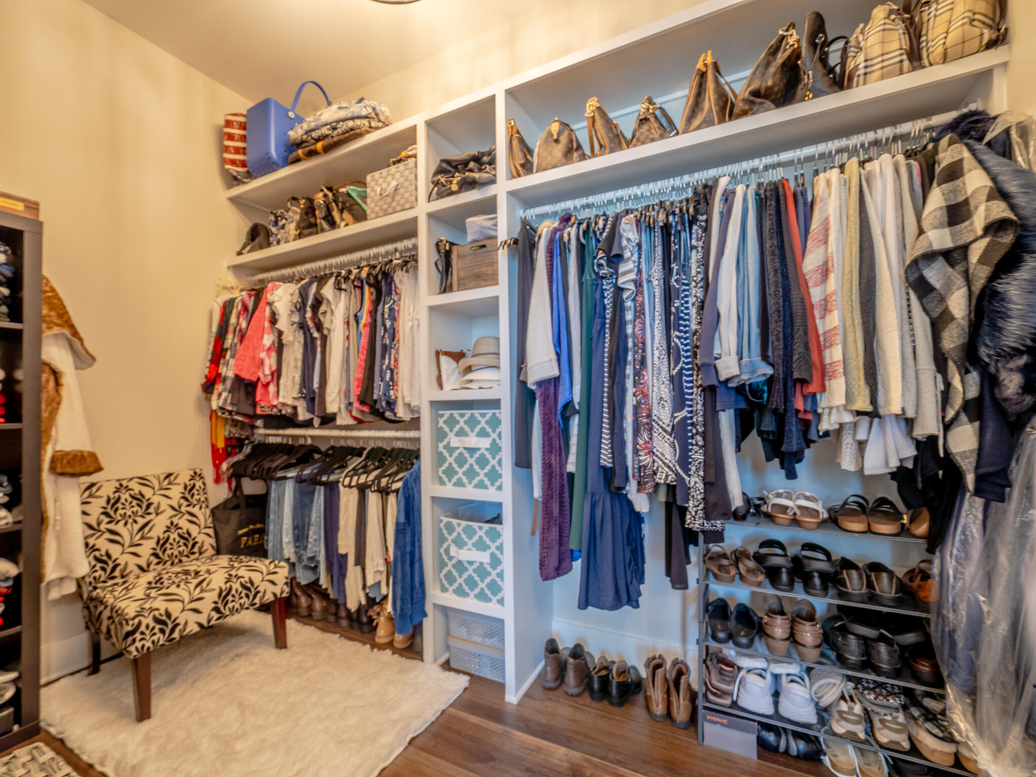 68 Dolphin Place Freeport, FL 32439 - Photo 60 of 118 a view of walk in closet with clothes and shoes