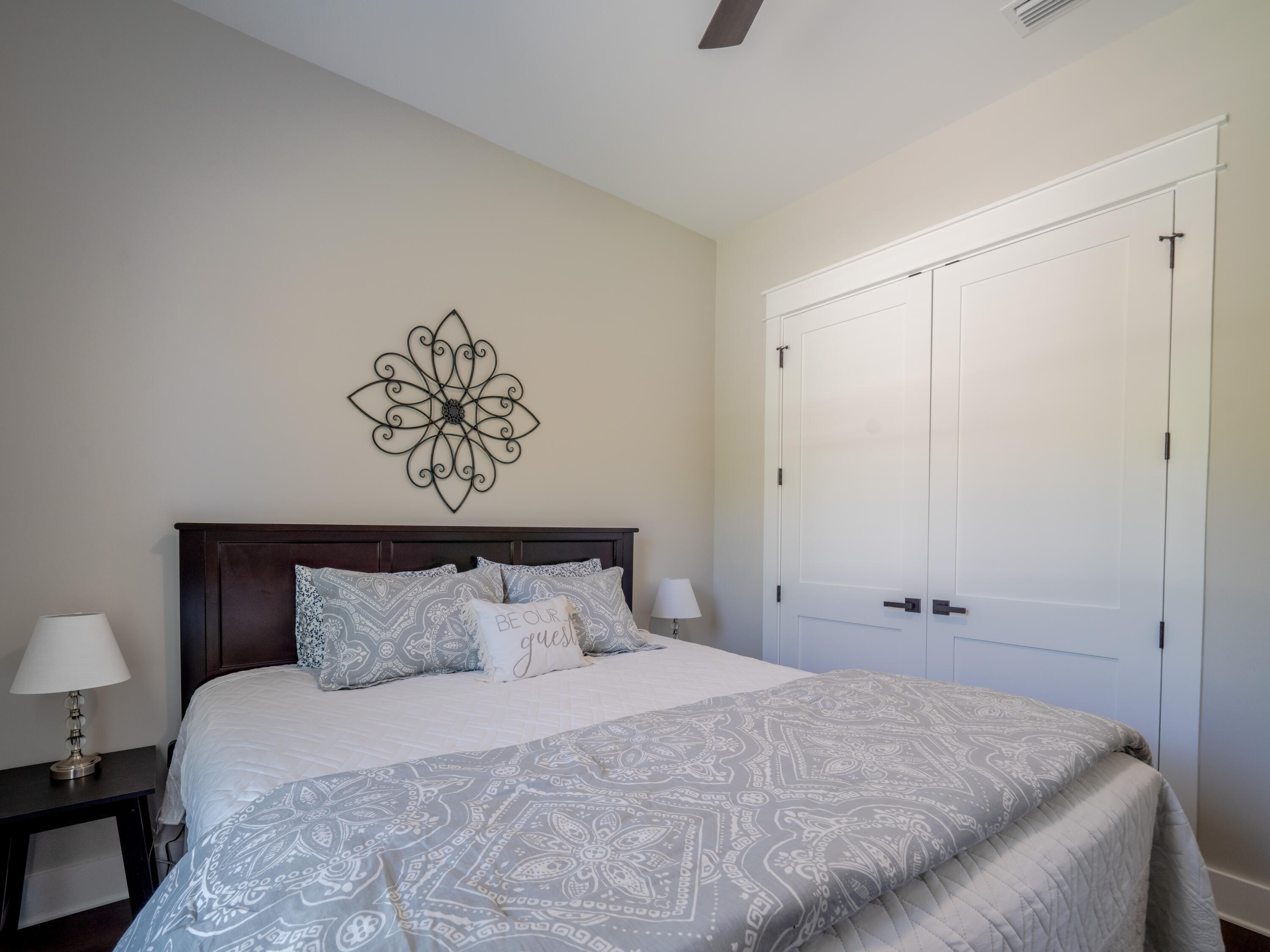 68 Dolphin Place Freeport, FL 32439 - Photo 72 of 118 a bedroom with a bed and a table in it