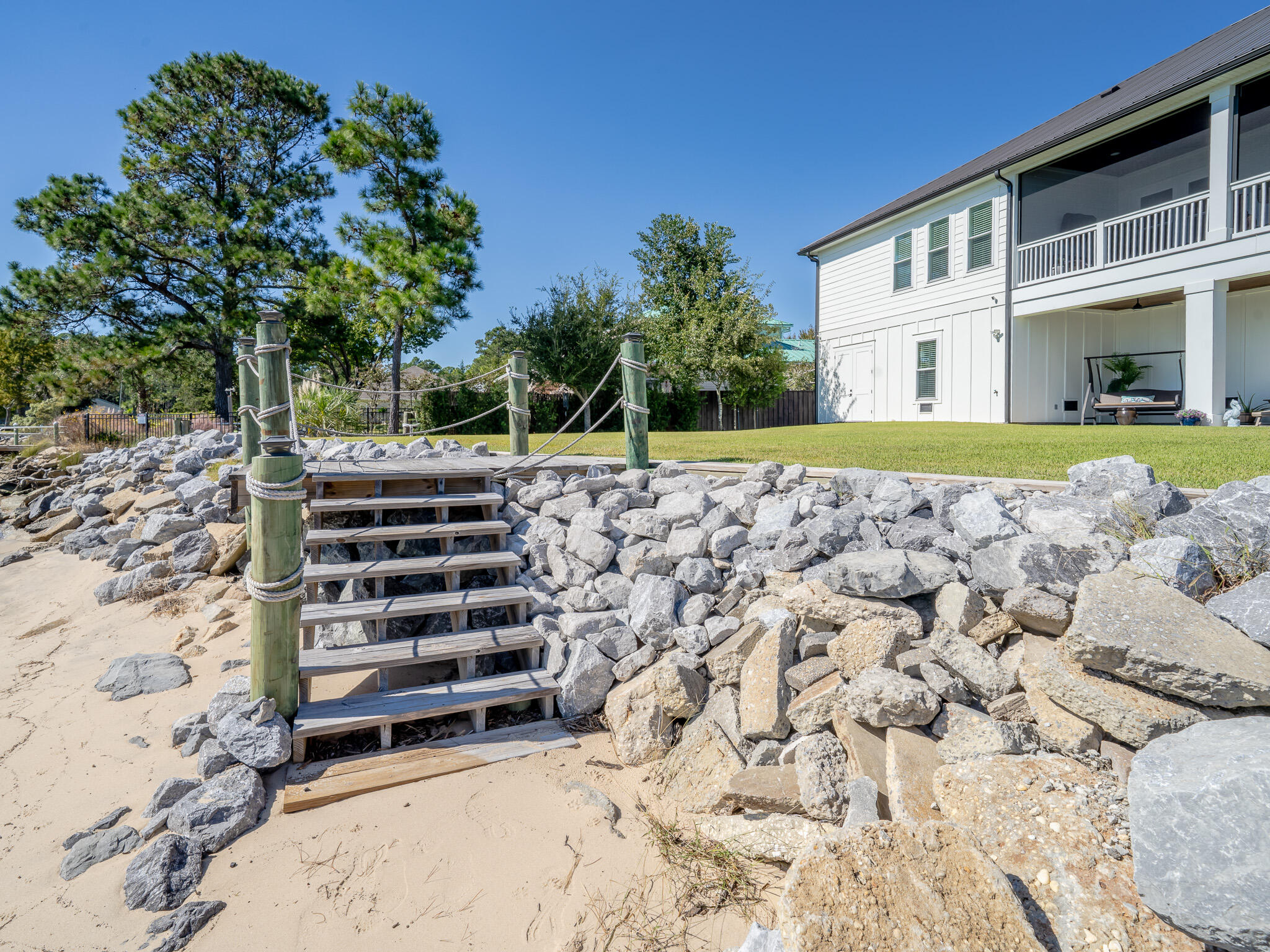 68 Dolphin Place Freeport, FL 32439 - Photo 95 of 118 a front view of a house with a yard