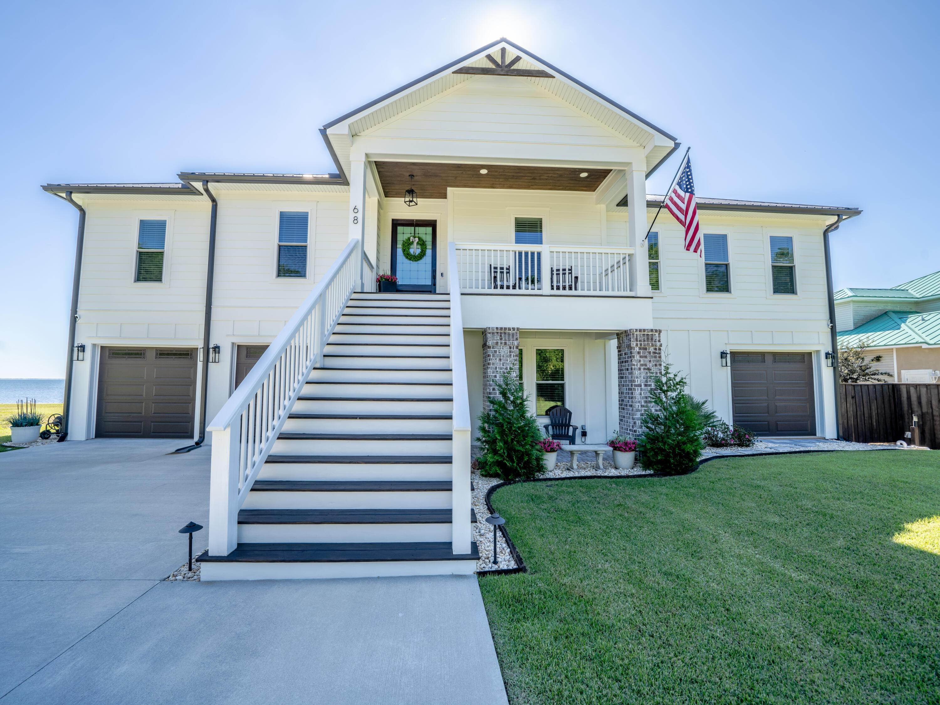 68 Dolphin Place Freeport, FL 32439 - Photo 10 of 118 Welcoming Staircase